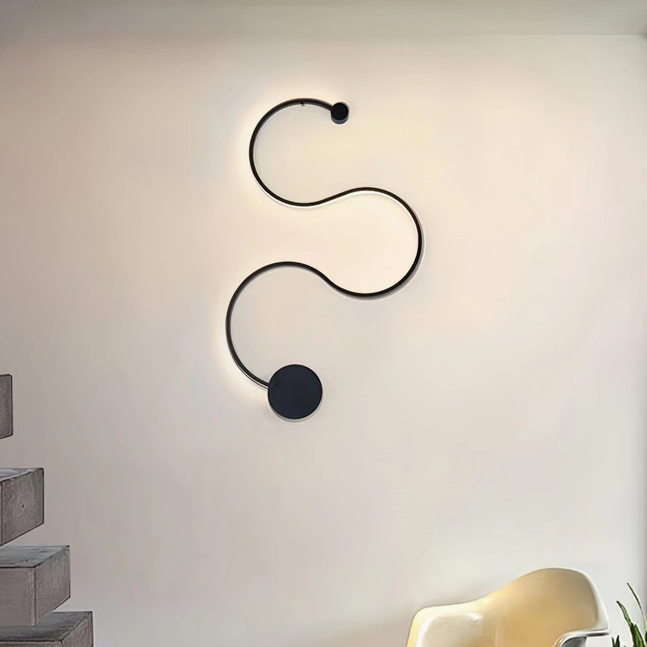 Style A sculptural snake curved wall sconce with organic flowing form and integrated LED