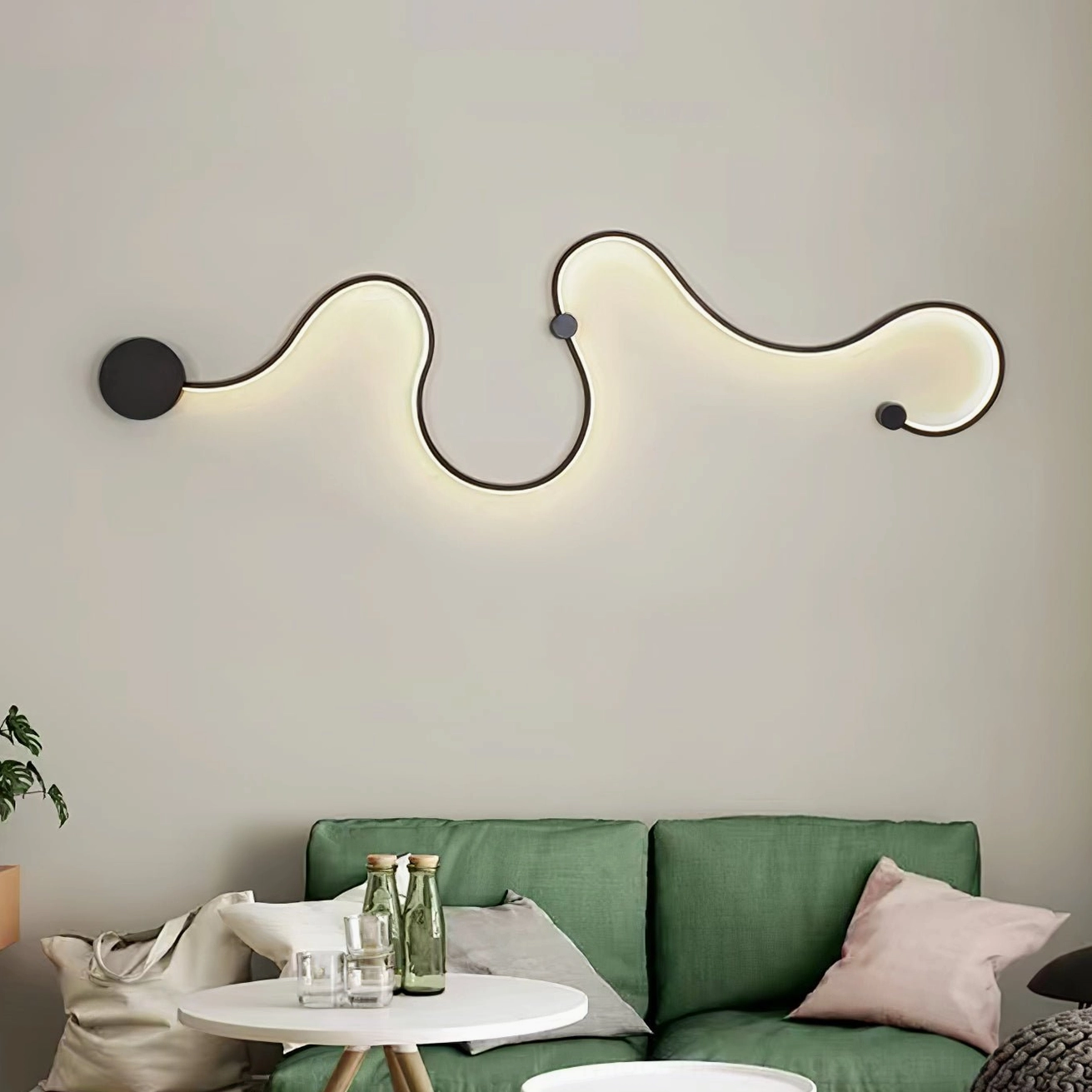 Style B medium snake wall lamp with flowing serpentine form and integrated LED lighting