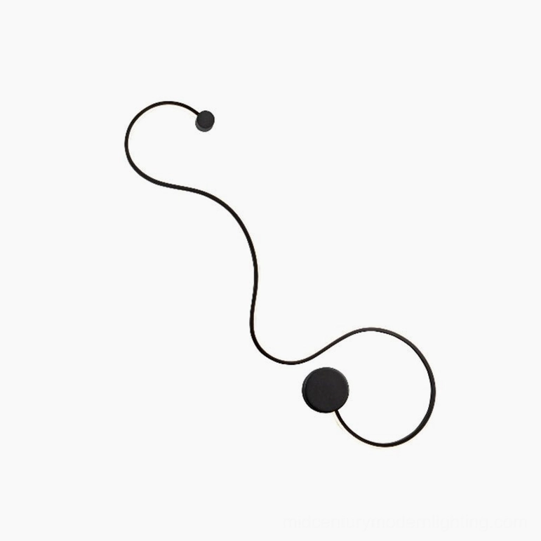 Style C snake wall lamp demonstrating sculptural form and contemporary minimalist aesthetic
