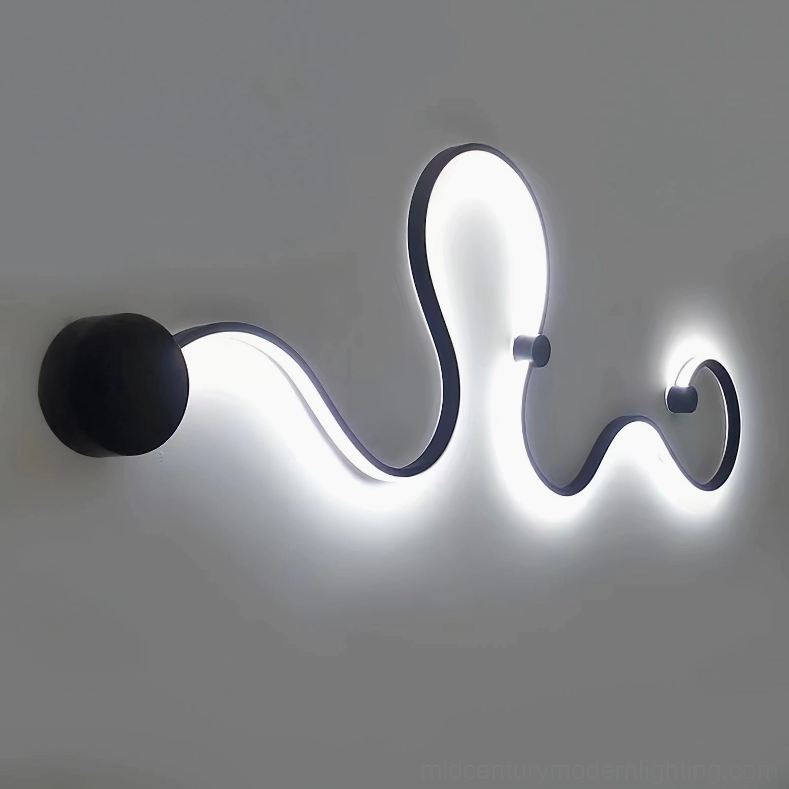 Style D matte black snake wall lamp showing full sculptural length and LED integration