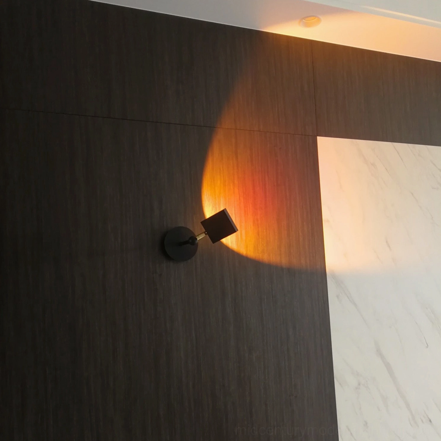 Sunset Halo wall sconce optical projection system close-up detail aluminum body