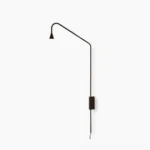 Svarna black minimalist wall sconce with curved metal arm and conical lamp head, front view studio shot