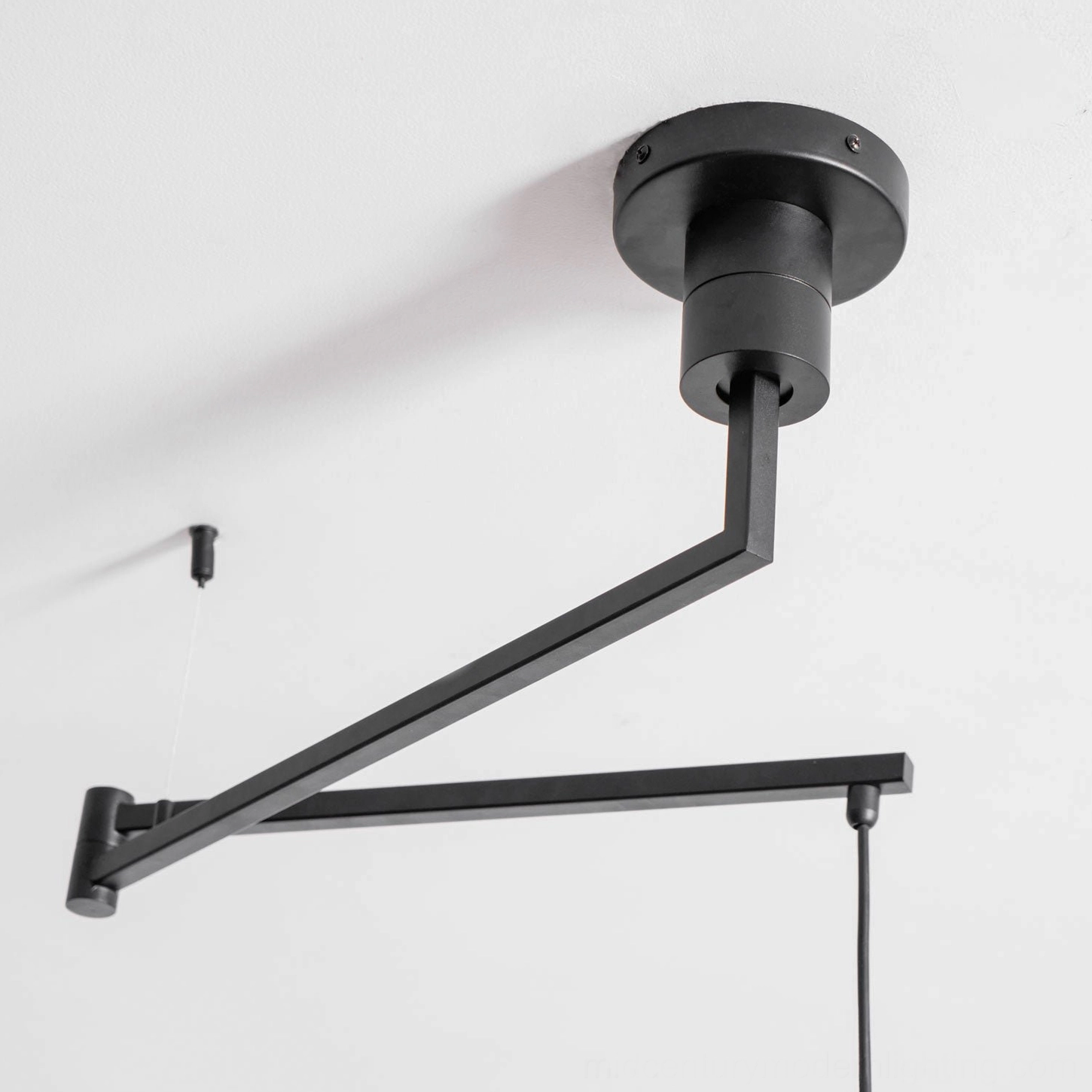 Rancho swing arm pendant light front elevation showing layered shade disc design