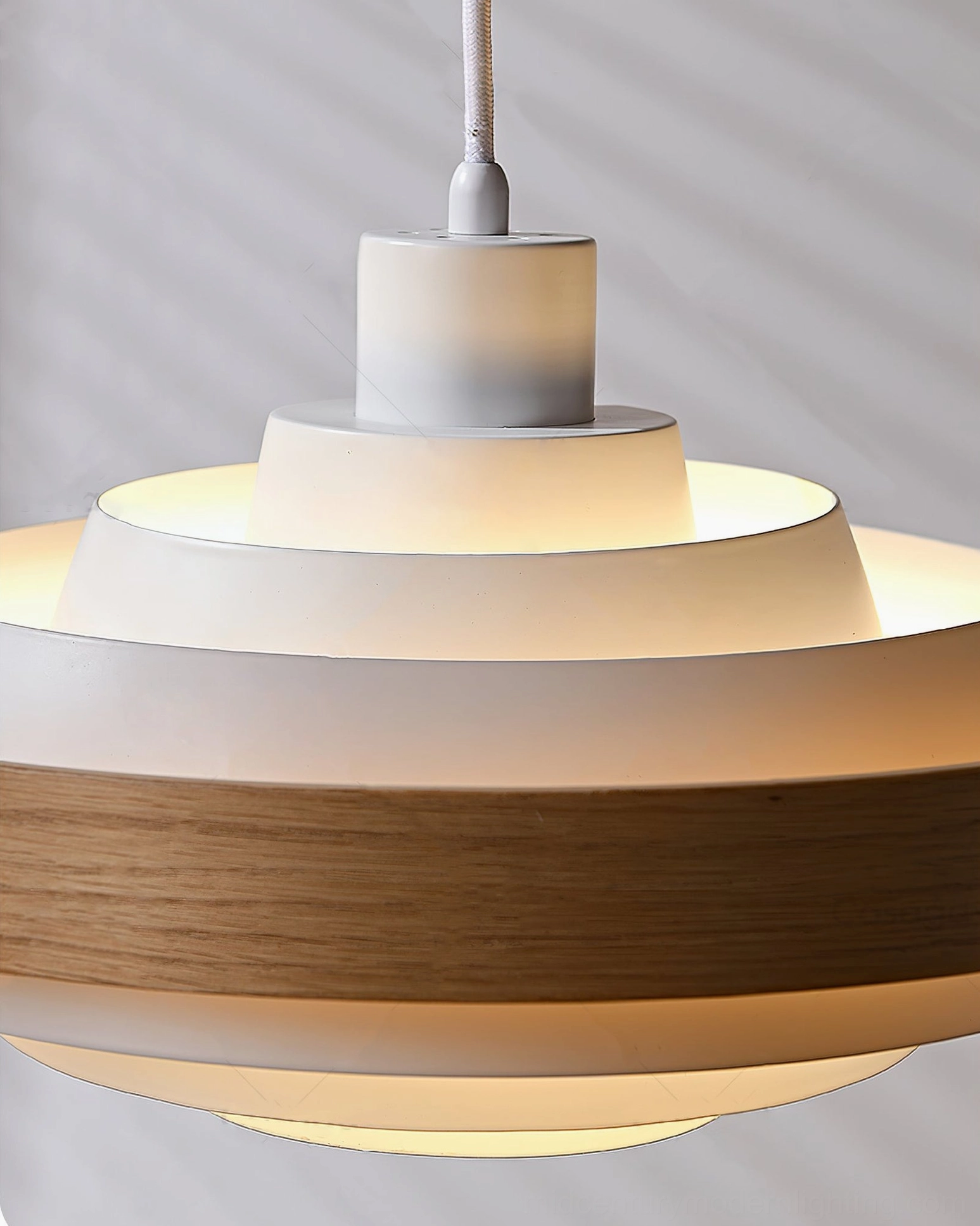 Adjustable swing arm pendant light installation showing ceiling canopy mount and wiring