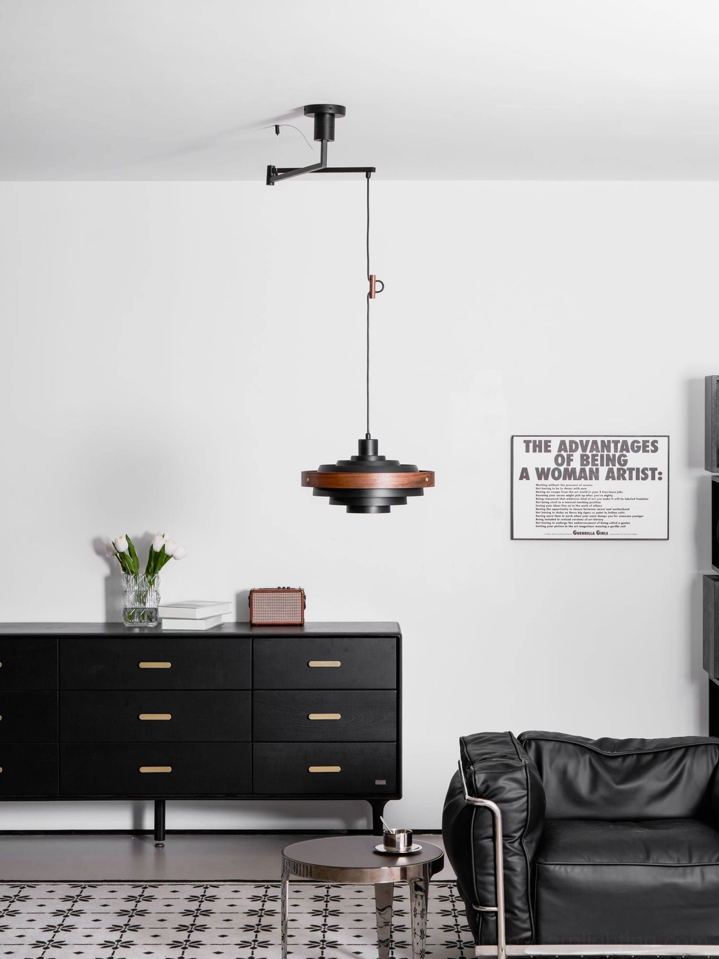 Rancho swing arm pendant light positioned above kitchen island with warm ambient light