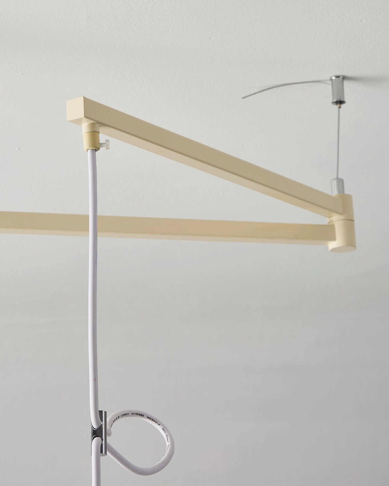 Eden swing arm pendant light hanging at different height angles demonstrating adjustable arm flexibility for various room applications
