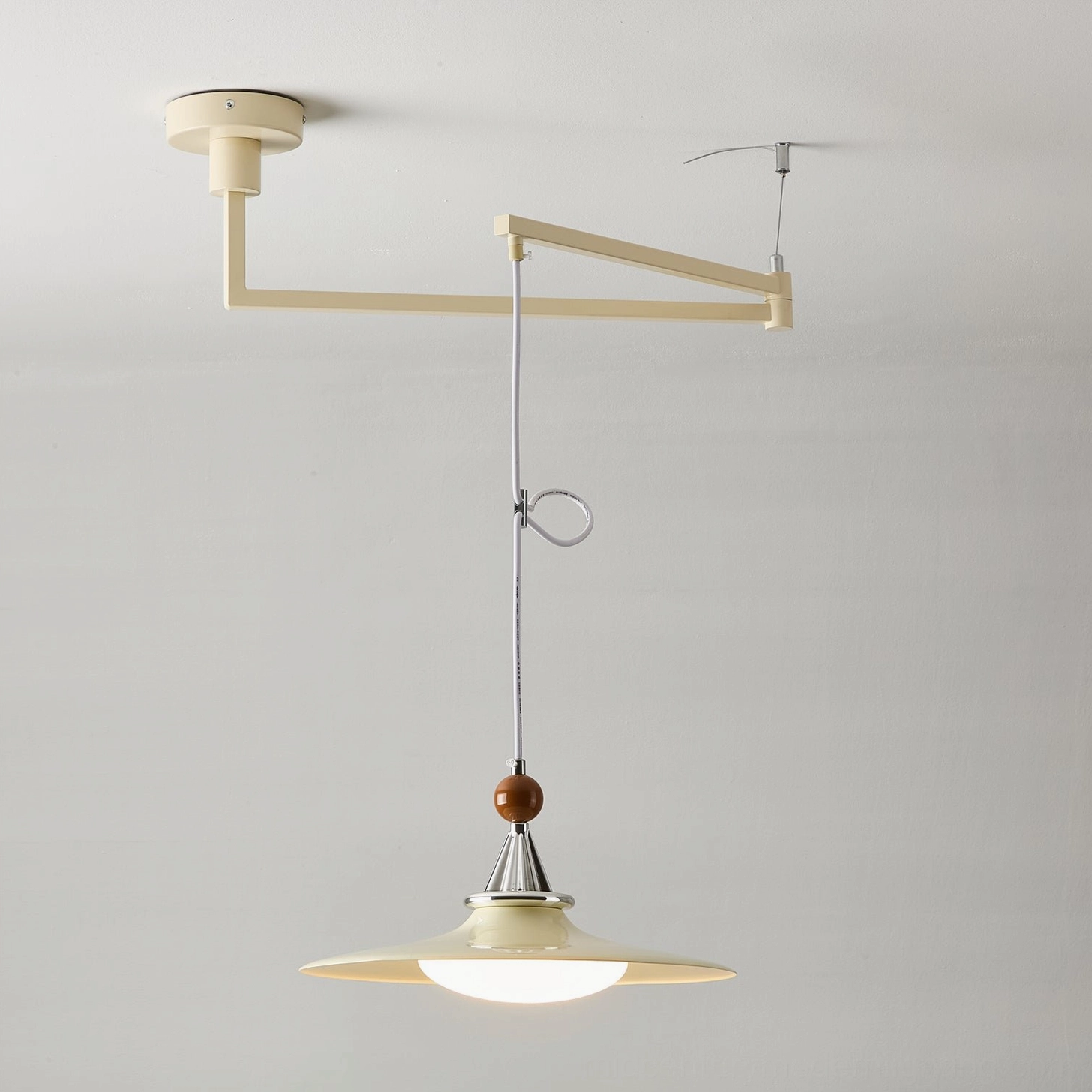 Eden pendant light side profile showing depth and dimensional design of saucer-style shade with green accent and chrome detailing