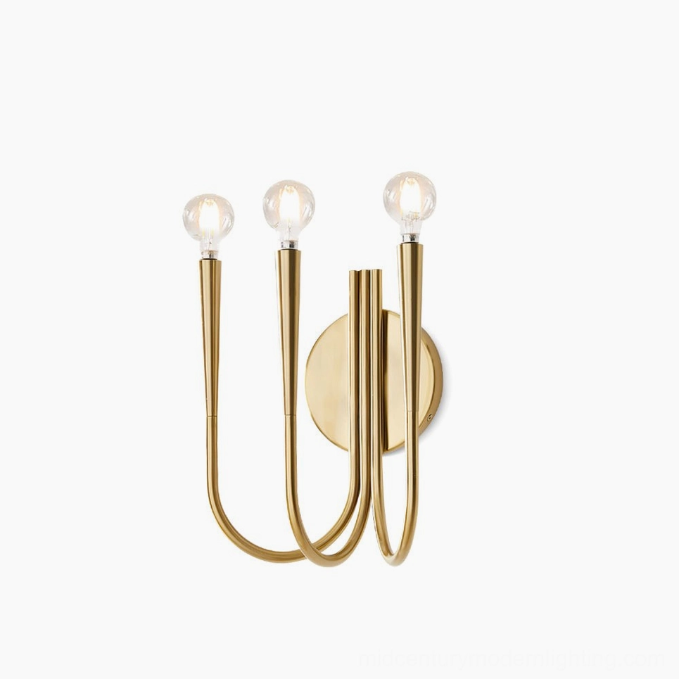 Swoop modern wall sconce with polished gold metal finish displayed against studio white background, showcasing sculptural curved arms and minimalist design