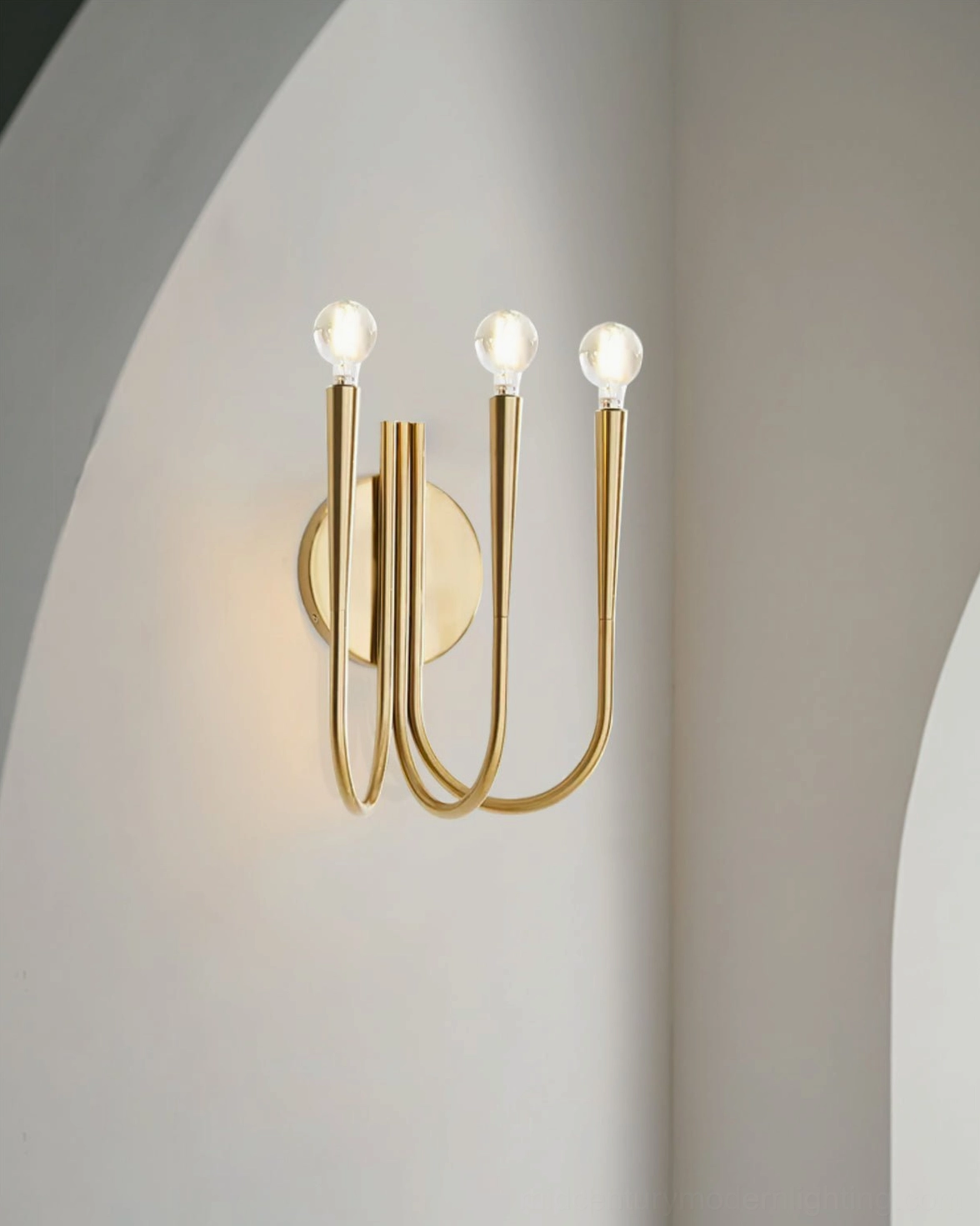 Swoop wall sconce showcase image highlighting sculptural elegance and minimalist mid-century modern design aesthetic