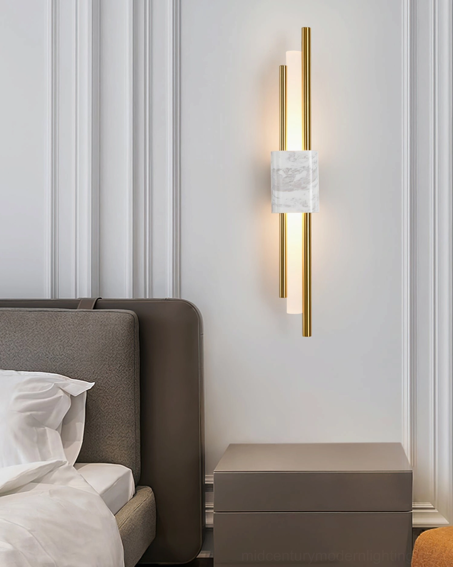 Tanto marble wall sconce as bedside reading light on master bedroom nightstand wall - contemporary sculptural fixture