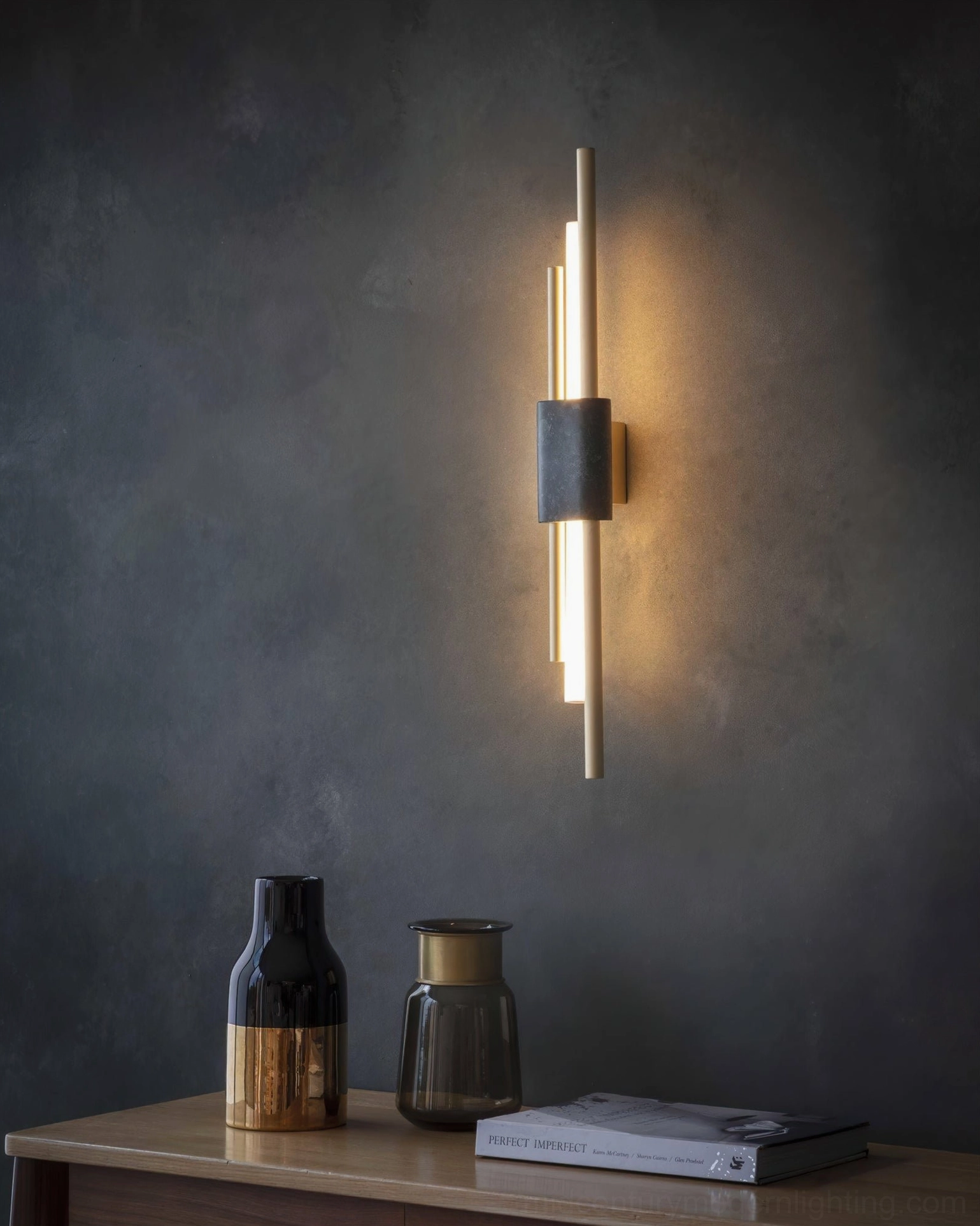Tanto marble wall sconce in gallery setting with artwork - museum-quality contemporary wall-mounted light