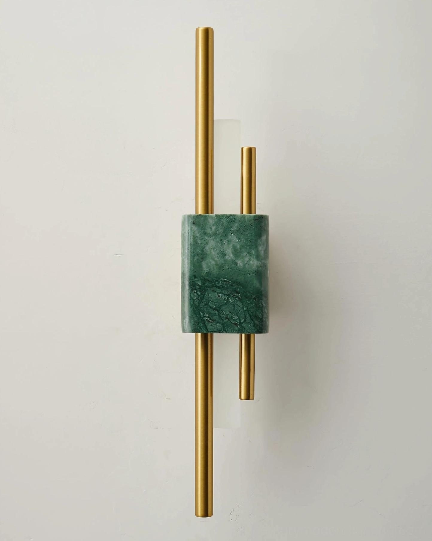 Tanto marble wall sconce in green with brass accents on off-white wall - mid-century modern style lighting