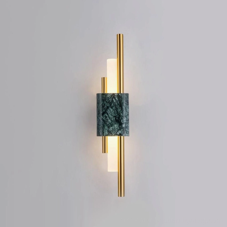 Tanto wall sconce with warm white LED light casting glow on light gray wall - ambient wall-mounted marble lighting fixture