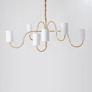 Tanyel chandelier elegant brass curved arms with crystal bead details and white cylinder fabric shades studio photograph