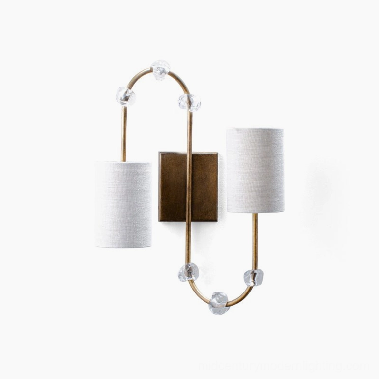 Tanyel symmetrical two-light wall sconce with U-shaped brass frame and off-white fabric shades
