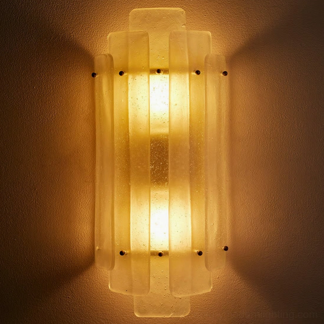 Tasha Art Deco wall sconce with illuminated frosted glass and bright interior light detail