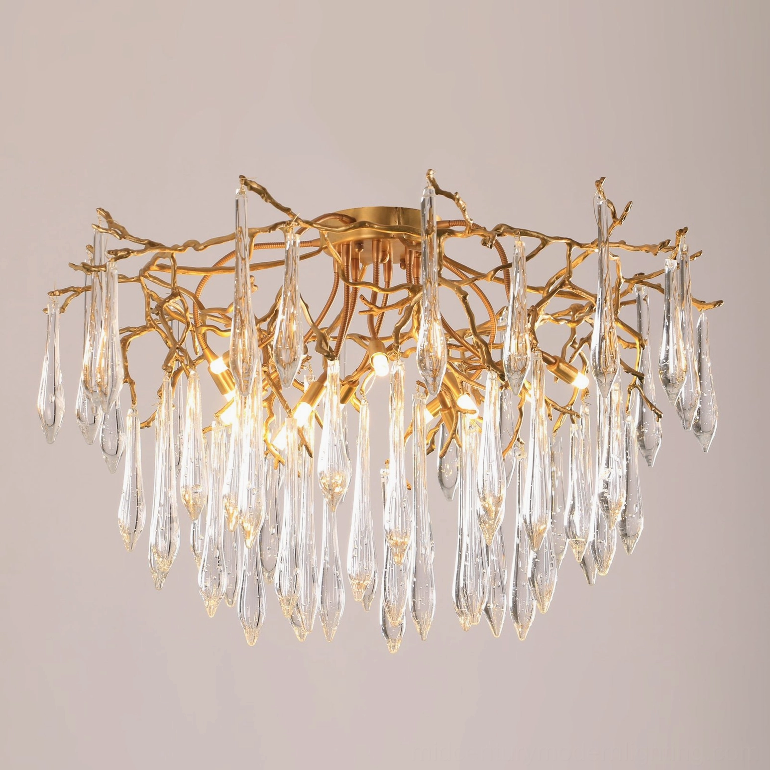Teardrop crystal ceiling fixture installed in contemporary home interior design