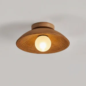 Teelin mid-century modern flush mount light top angle view displaying wood grain texture