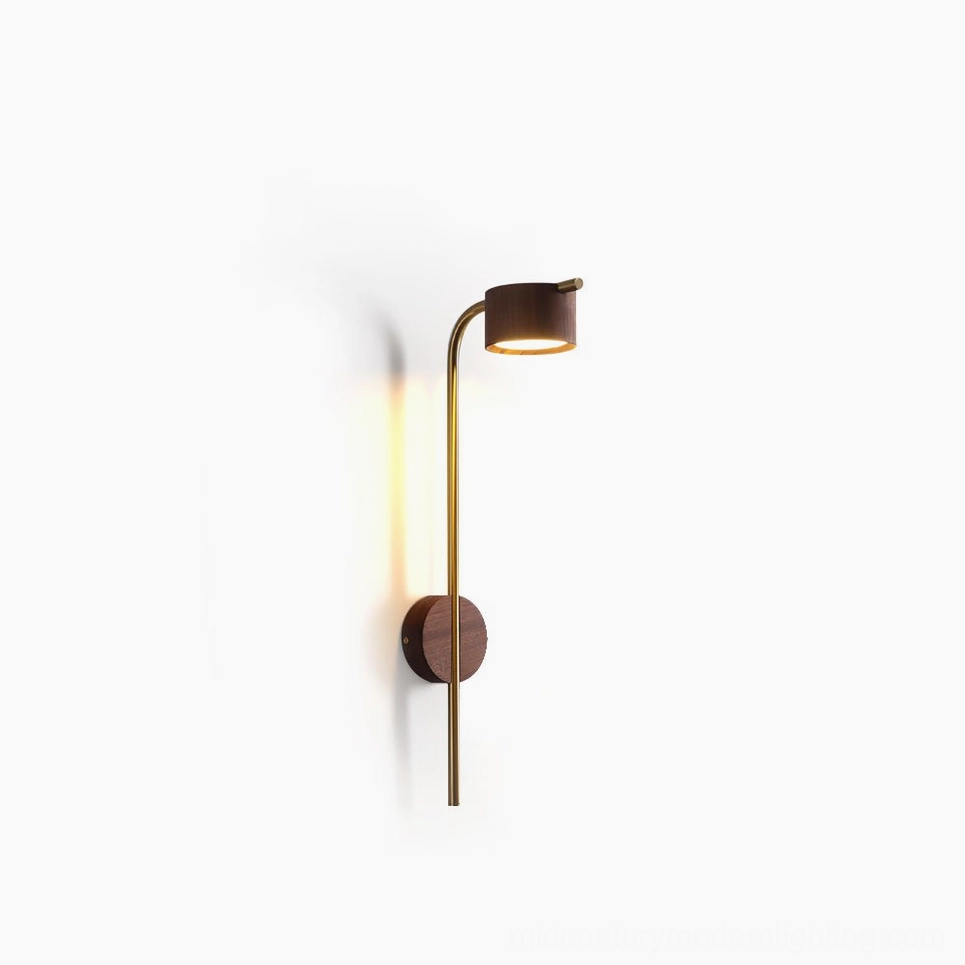 Terence arched brass wall sconce with walnut wood head, front studio view on white background