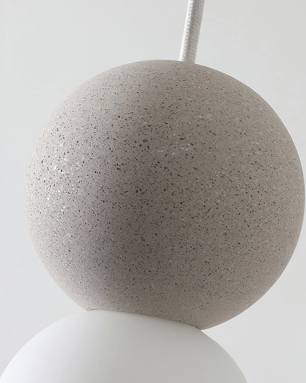 Terrazzo ball pendant light in bedroom with window blinds, minimalist nordic