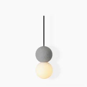 Terrazzo ball pendant light in grey and white studio view, modern minimalist design