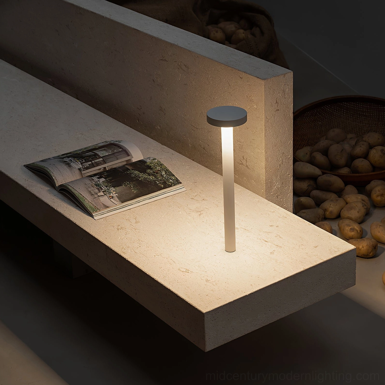 Tetatet touch dimmable table lamp with magnetic base on stone shelf warm ambient lighting