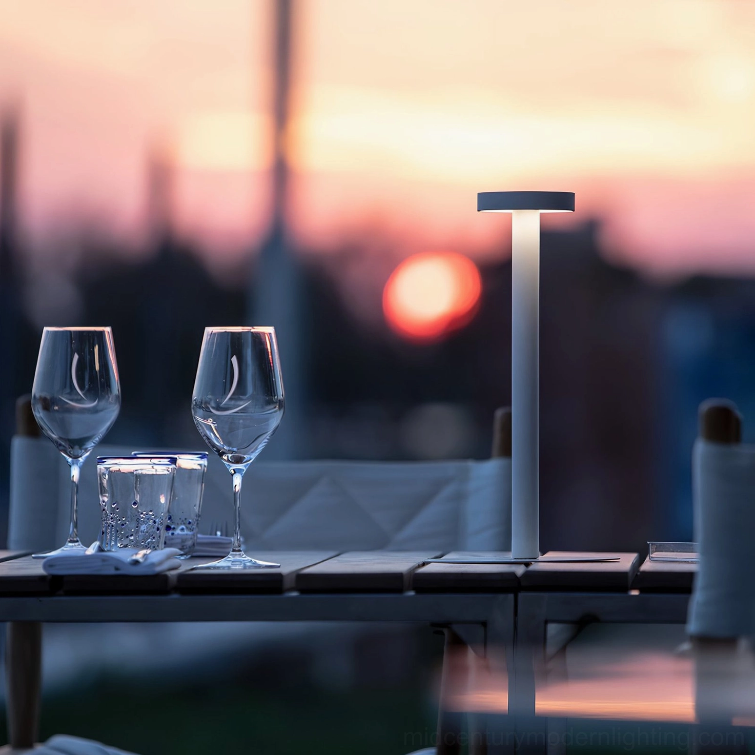 Tetatet cordless table lamp terrace sunset outdoor dining white minimalist cylinder