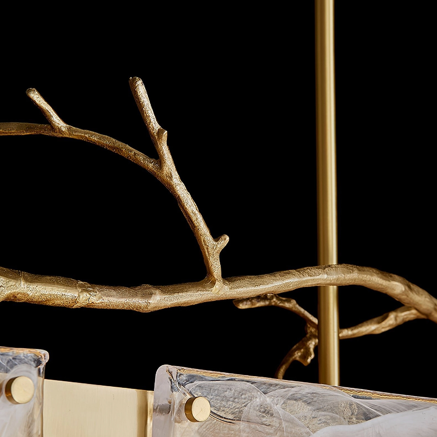 Thalassa contemporary brass and glass branch chandelier detailed product shot emphasizing craftsmanship and material quality