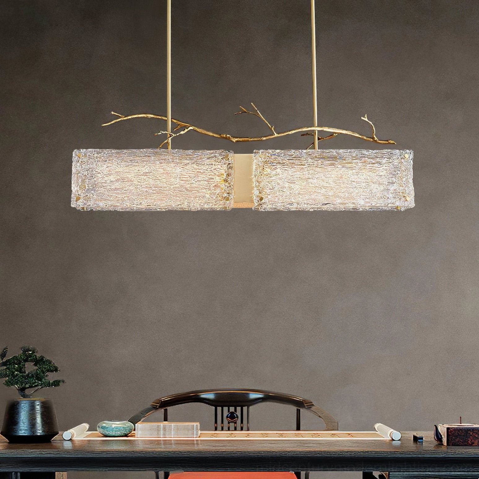 Thalassa dual glass pendant light in traditional study workspace with woven textured glass shades and gold branch accents