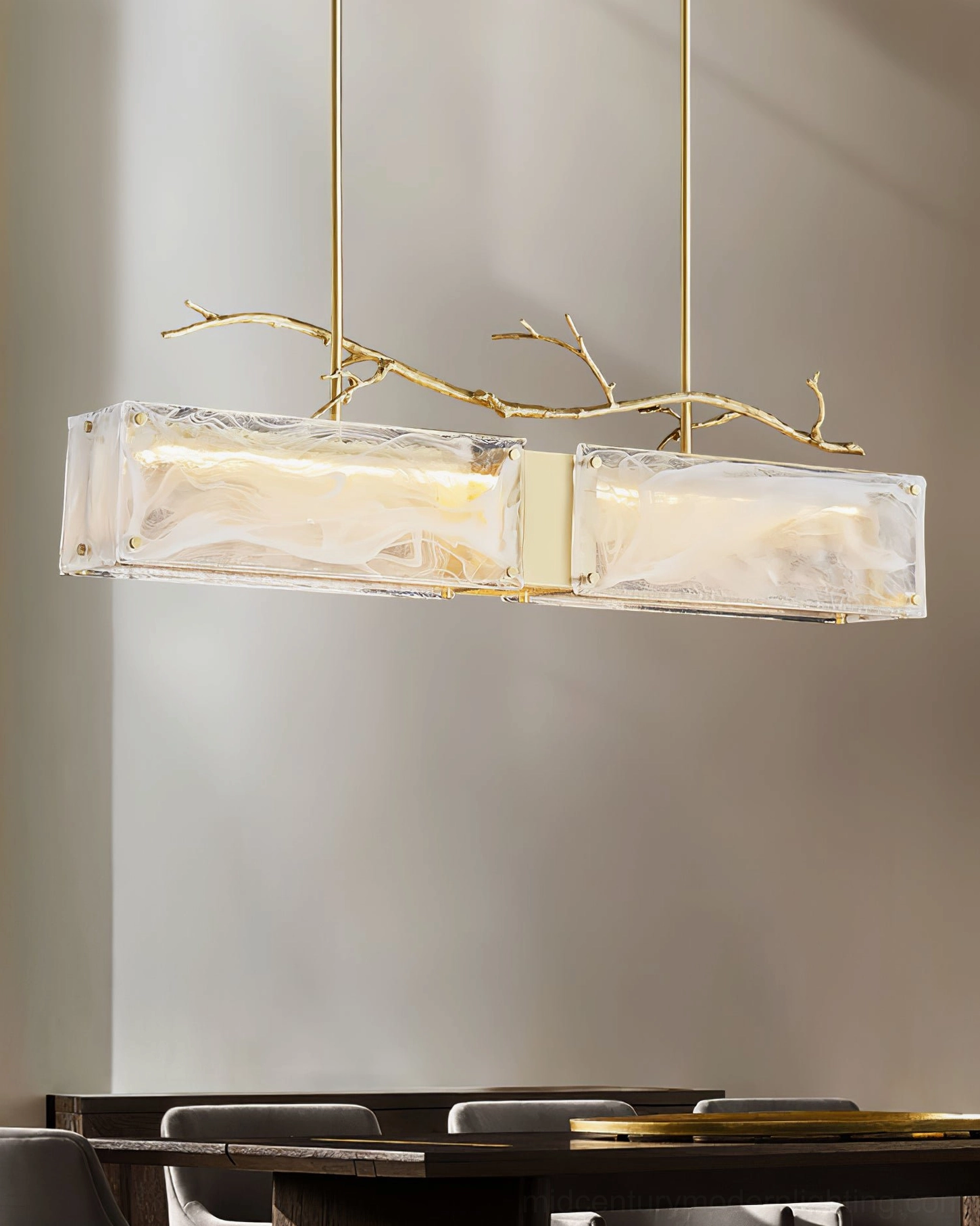 Thalassa glass branch chandelier close-up showing textured glass surface finish and precision brass metalwork construction