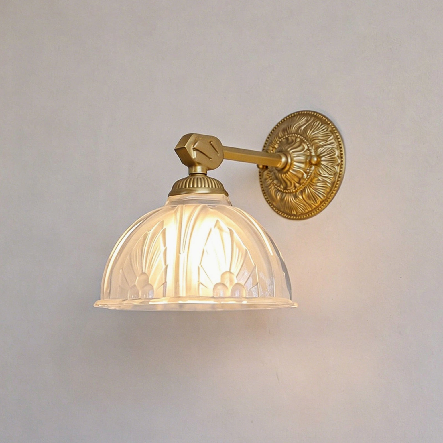 Thayer vintage brass wall sconce in home office beside desk and bookshelf lighting setup