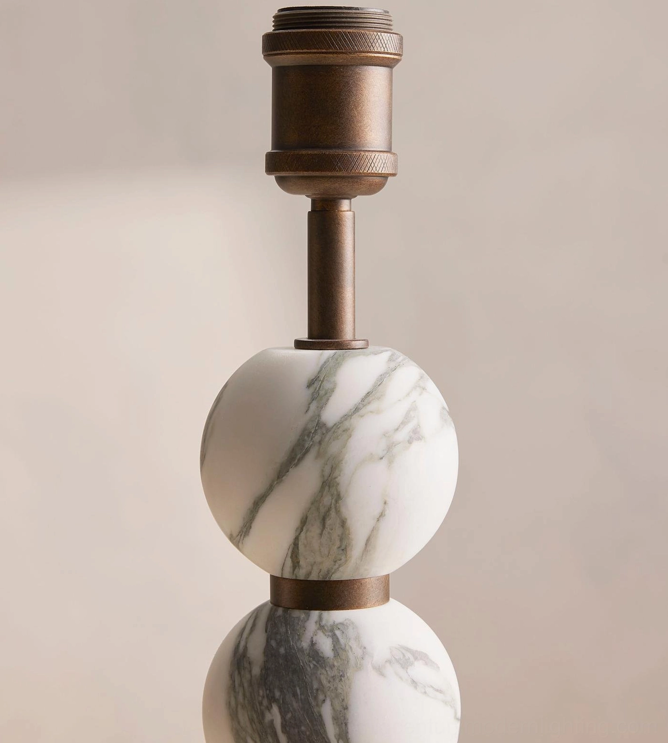Thelma lamp base without shade showing natural white marble spheres and bronze metal hardware assembly