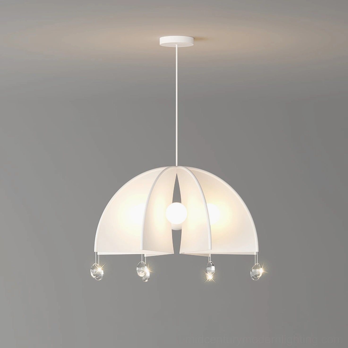 Thera crystal pendant lamp frontal view - four pairs of hanging crystal pendants with grey wall background