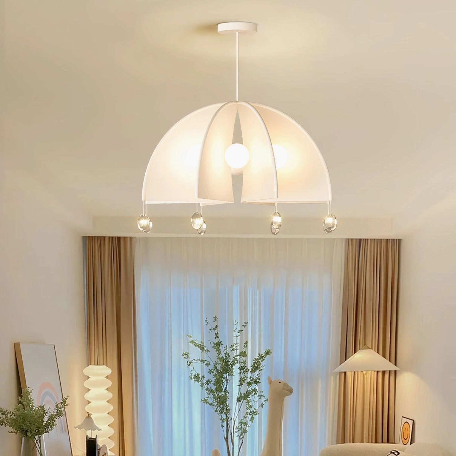 Thera modern pendant light in bright living room with green plant styling - contemporary home decor setting