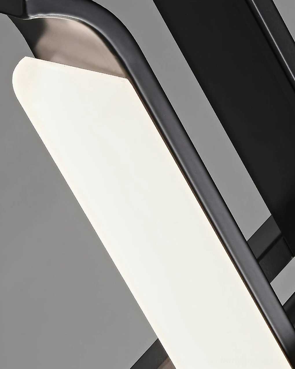 Three-color changing LED chandelier demonstrating geometric frame illumination and light distribution quality