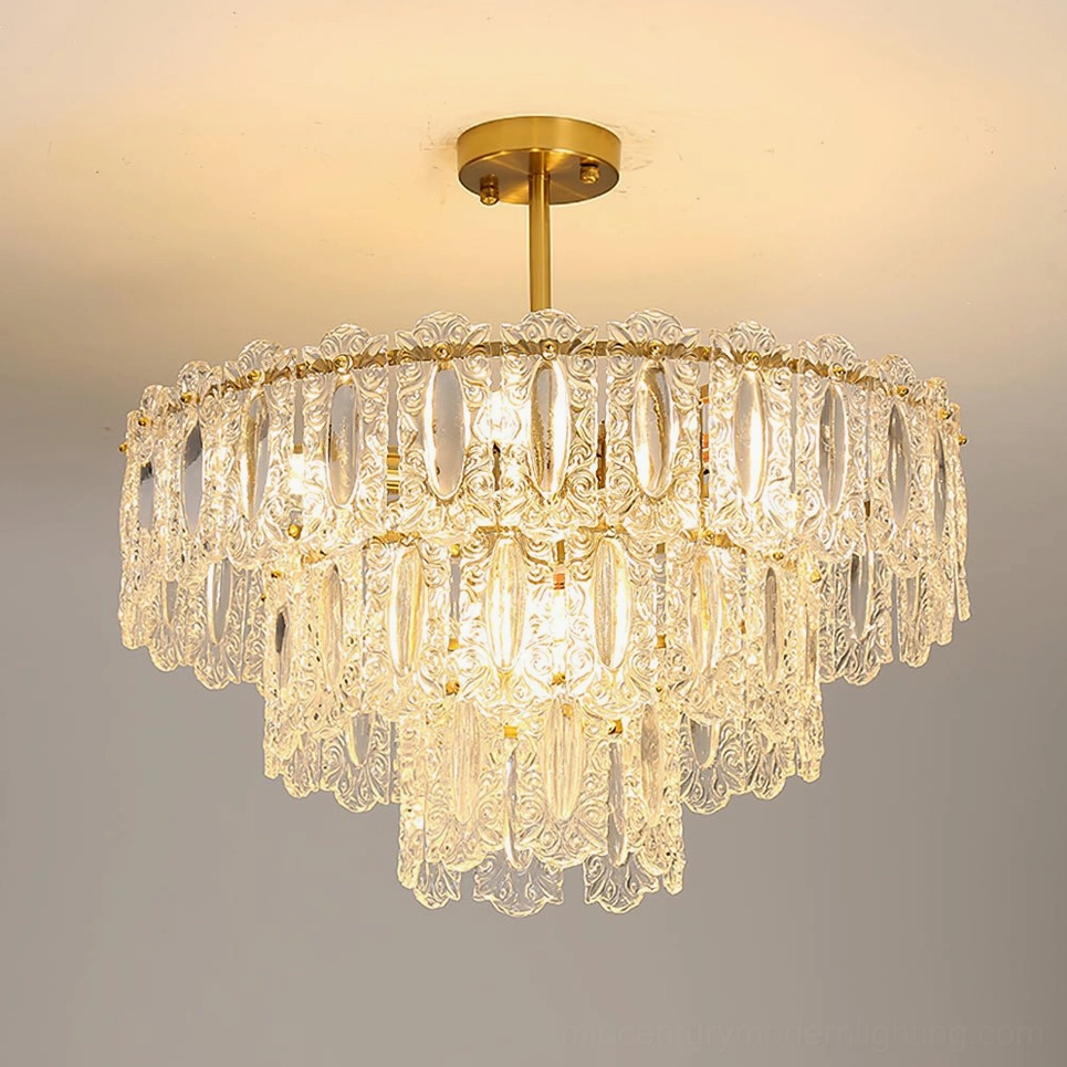 Three-tier Vienna crystal chandelier installed on ceiling with warm glowing light and brass finish