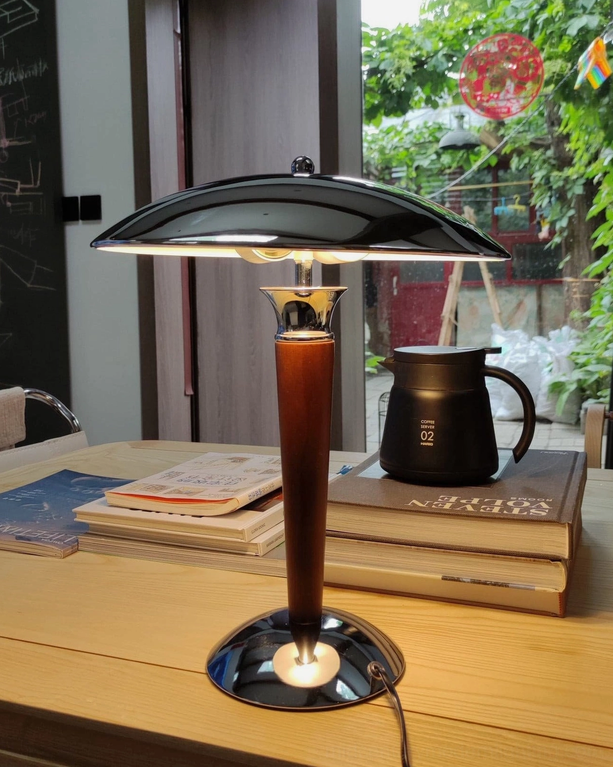 Tibby table lamp chrome shade showing polished reflective finish surface quality