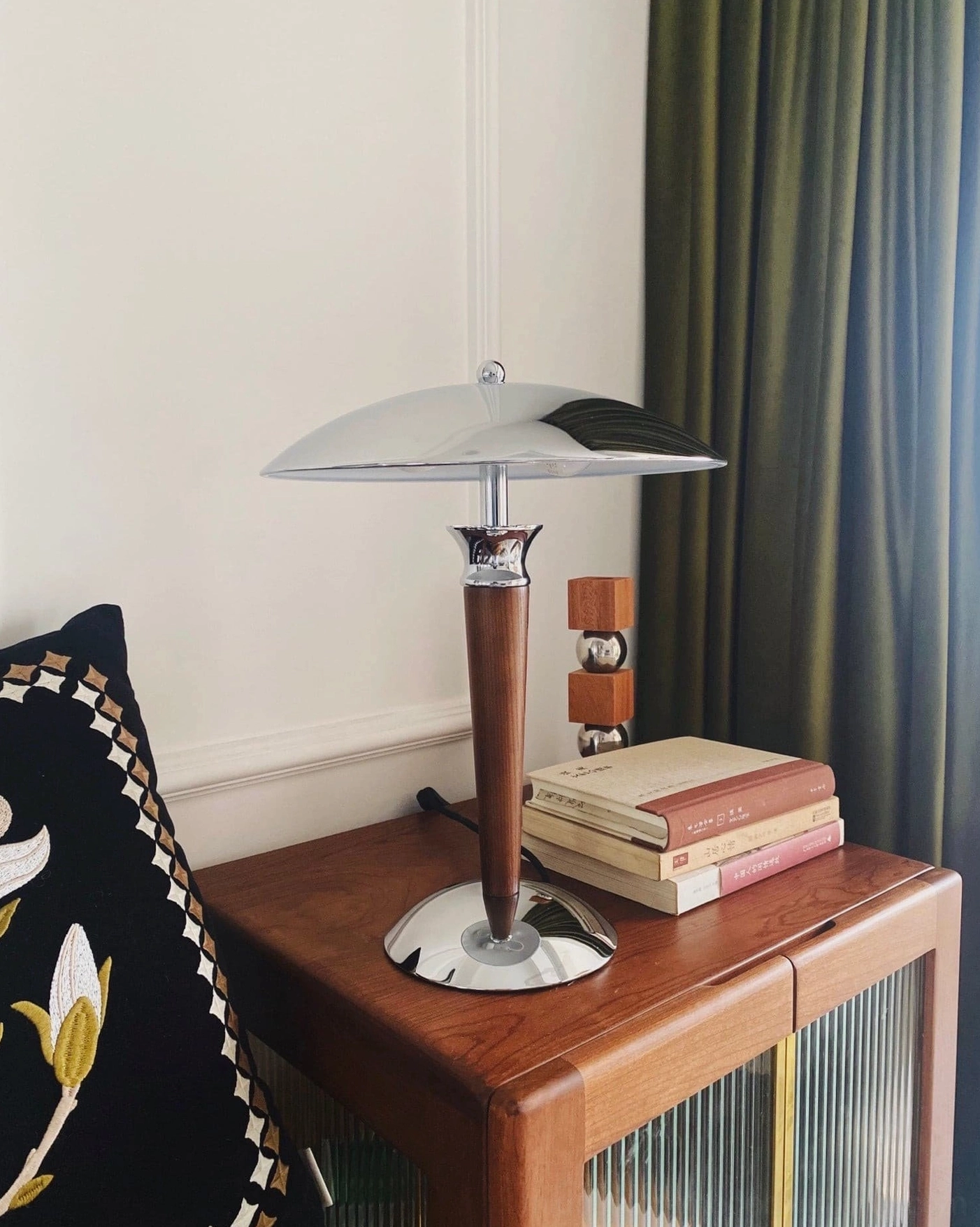 Tibby mid-century modern lamp positioned on entryway console table as sculptural display piece