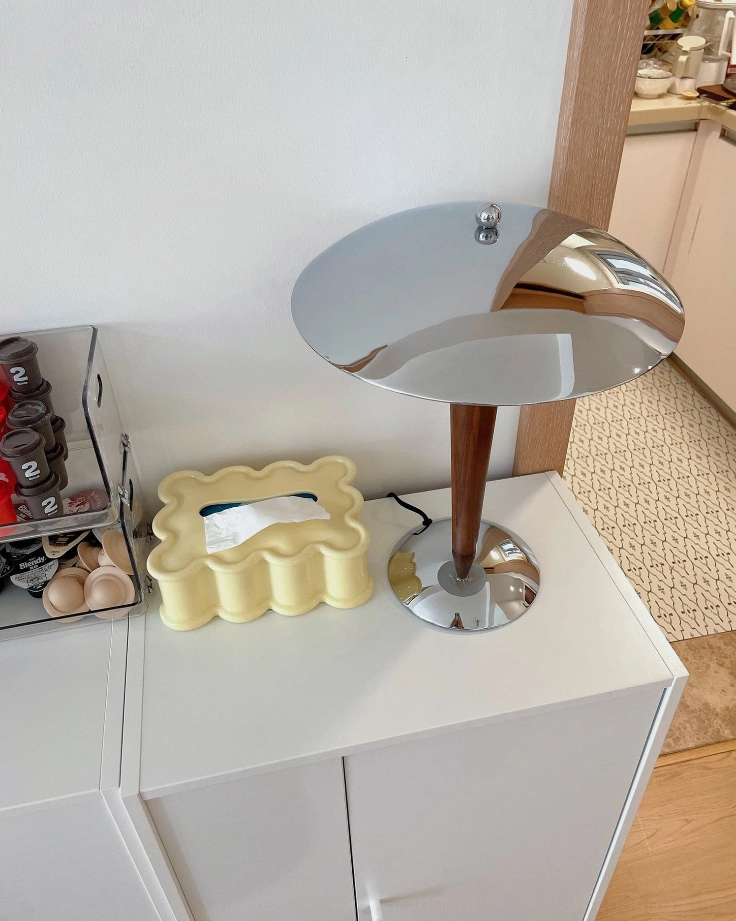 Tibby mid-century modern lamp paired with decorative home accessories and curated styling