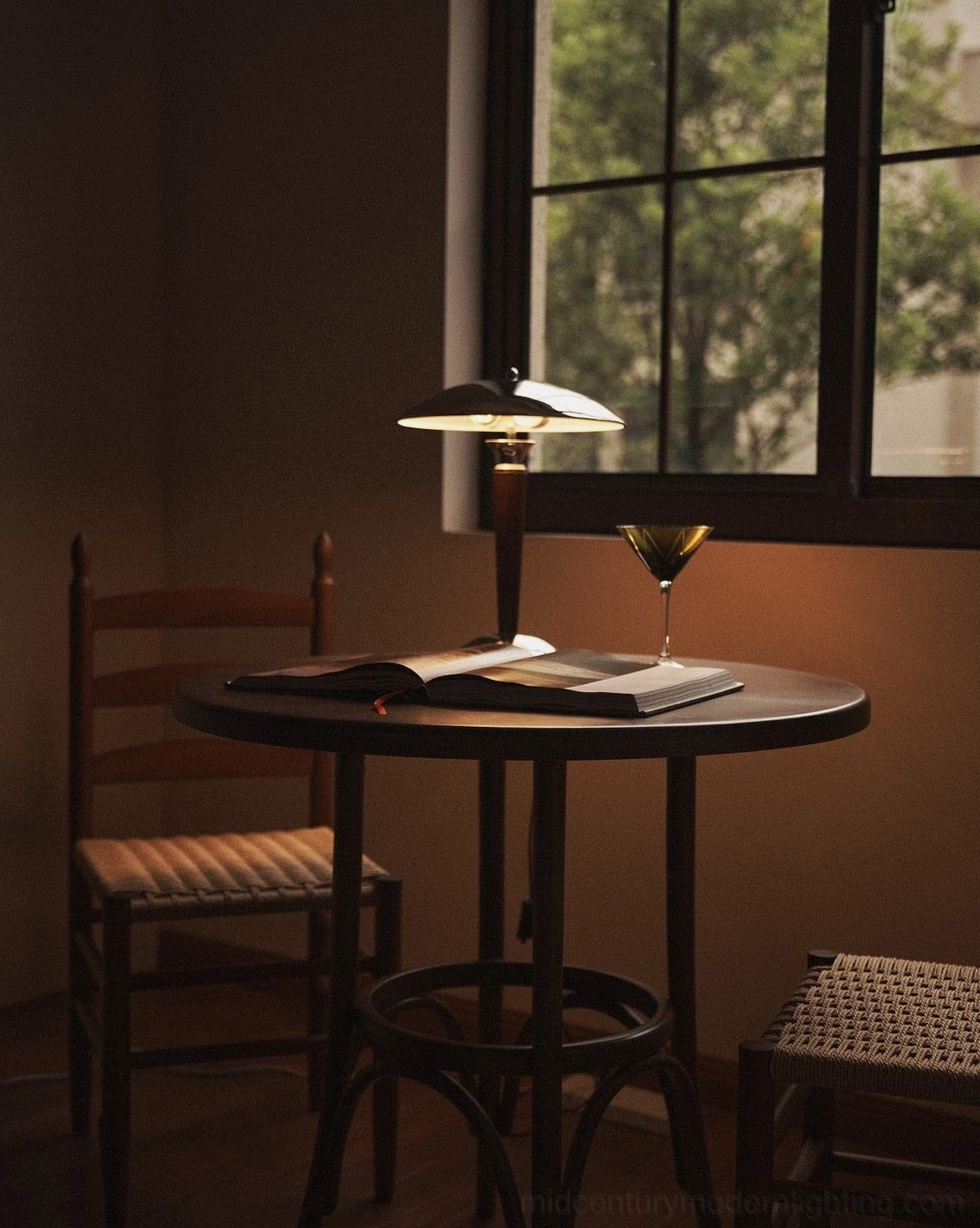 Tibby mushroom lamp providing warm ambient illumination in intimate dining nook with book and cocktail styling