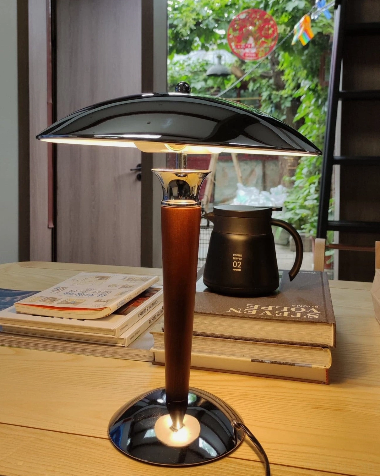 Tibby table lamp illuminated in low-light home environment demonstrating warm ambient glow