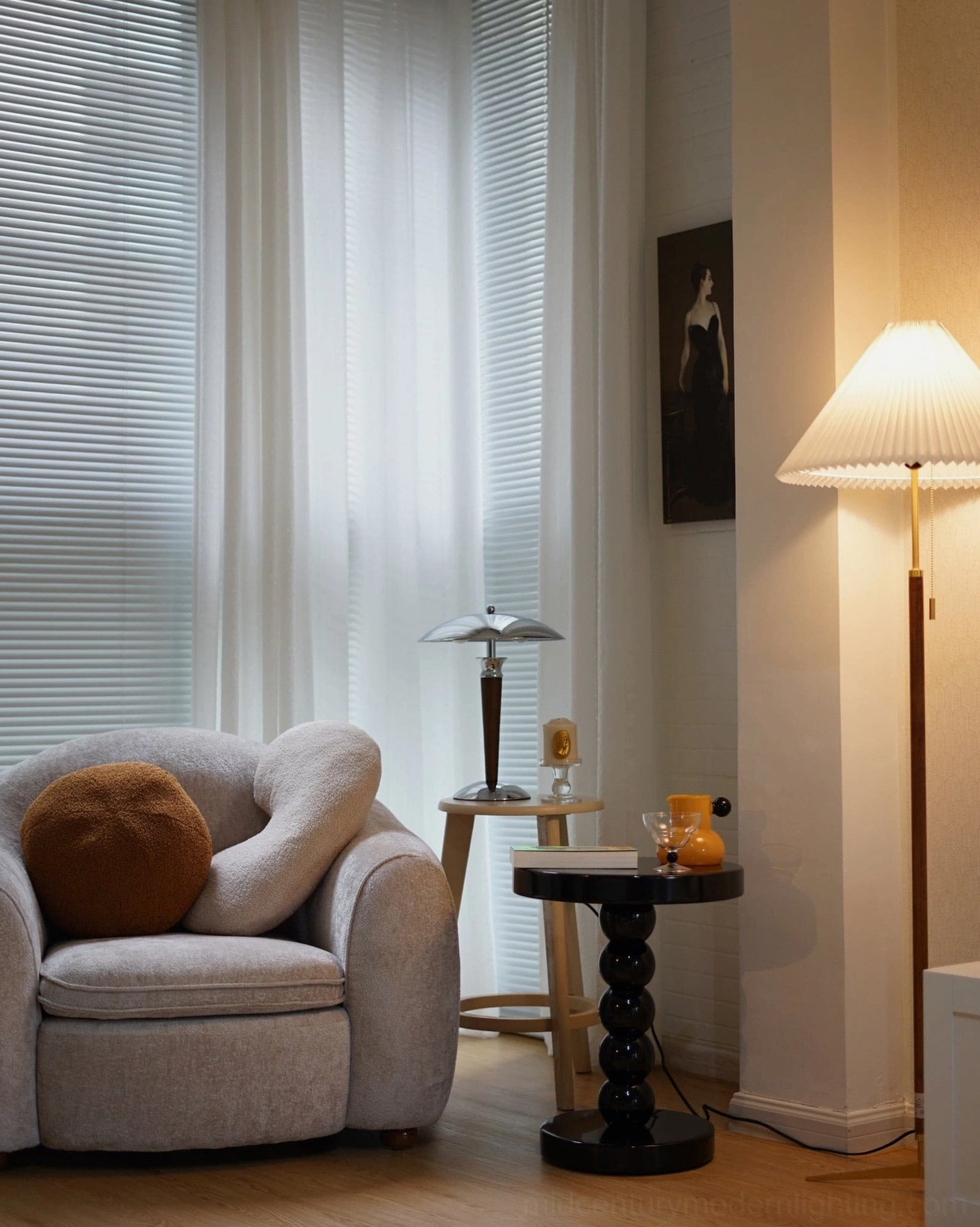 Tibby mid-century modern table lamp in cozy living room lounge creating warm ambient lighting with retro aesthetic