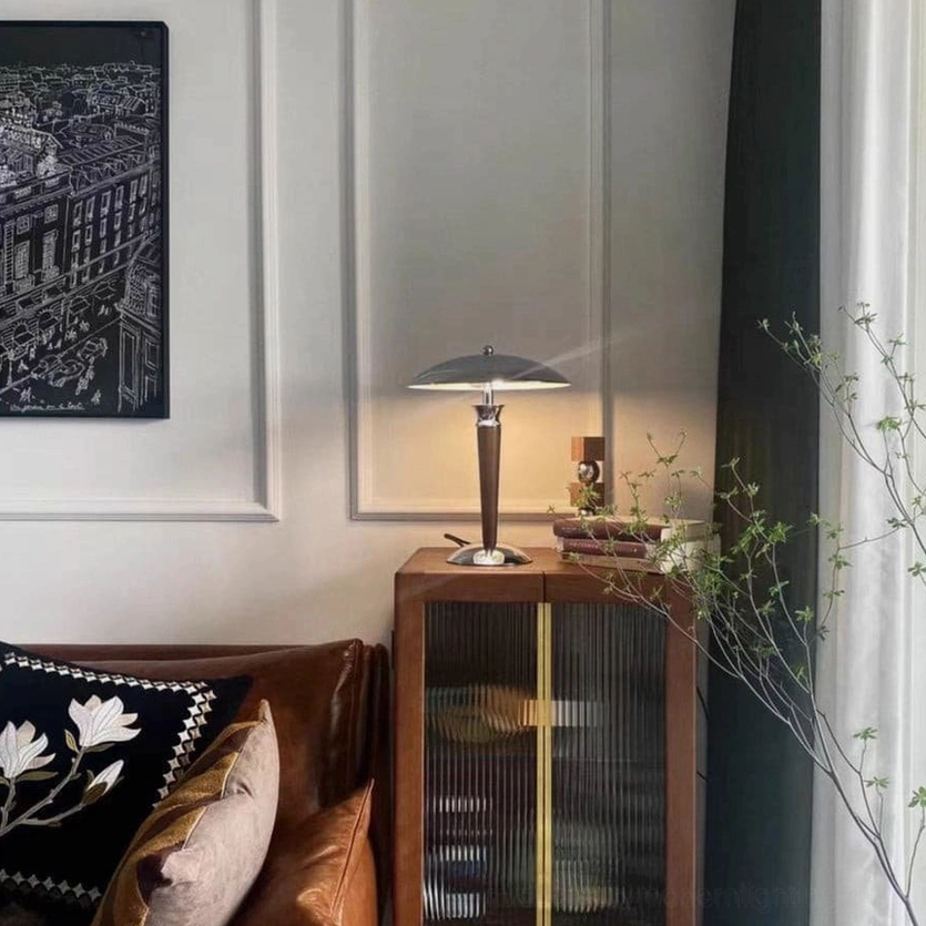 Tibby mid-century table lamp showing material composition metal shade and wood elements