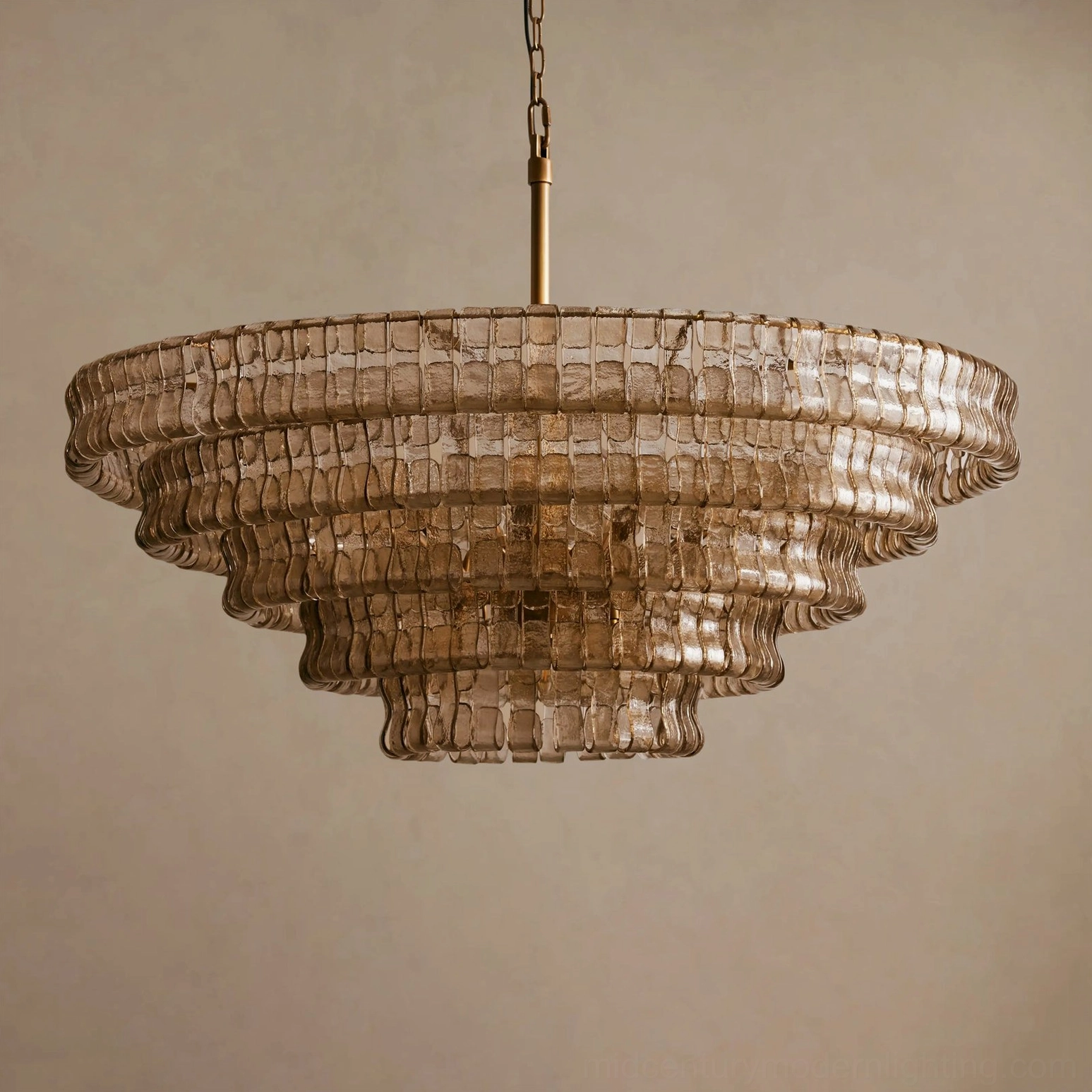 Tiered round chandelier suspended from ceiling, ice-textured glass layered composition, modern luxury lighting statement
