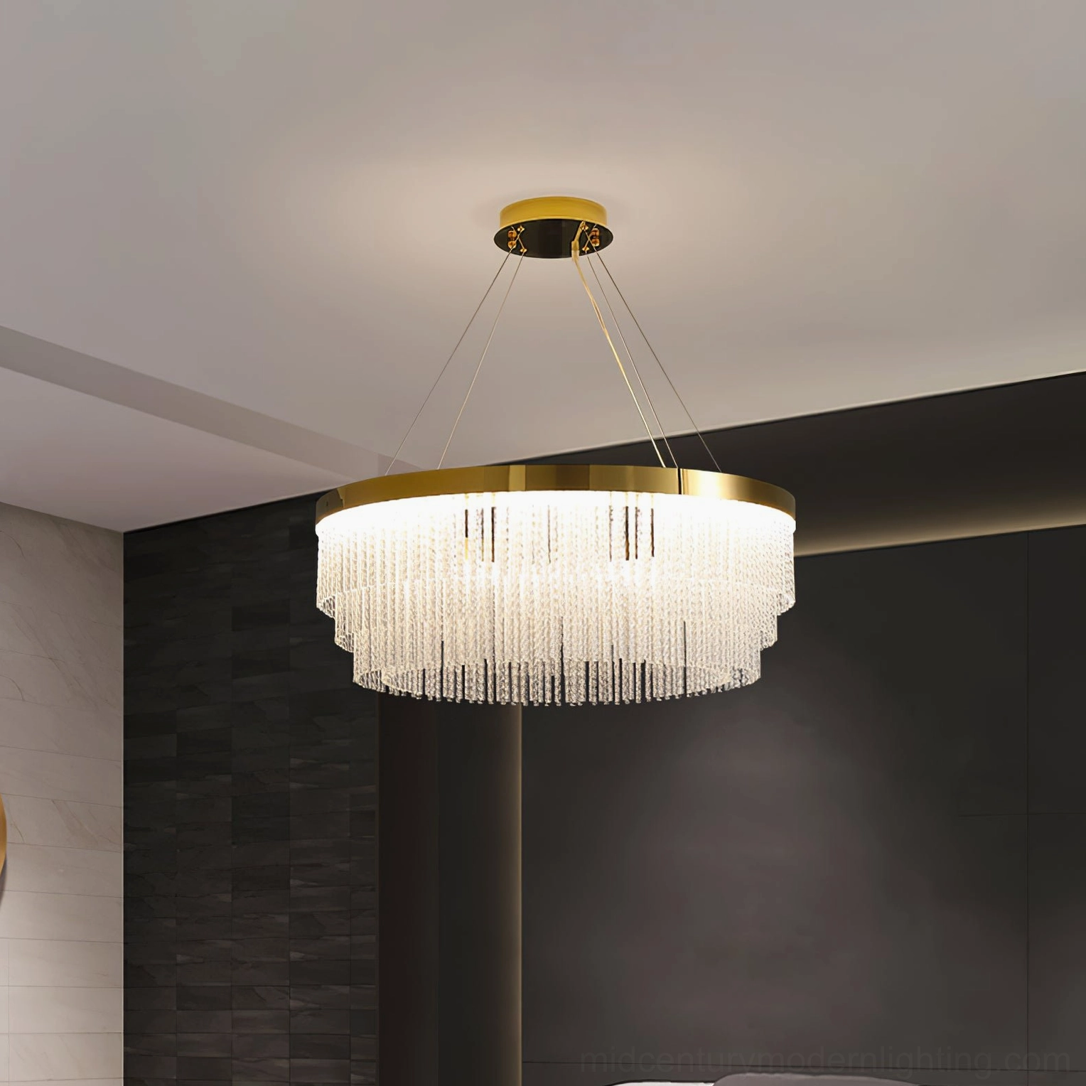 Tiered round crystal chandelier suspended from 150cm wire in contemporary ceiling installation