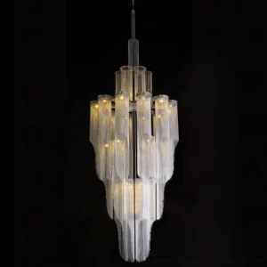 Modern tiered crystal chandelier with dark frame - studio product photography with black backdrop