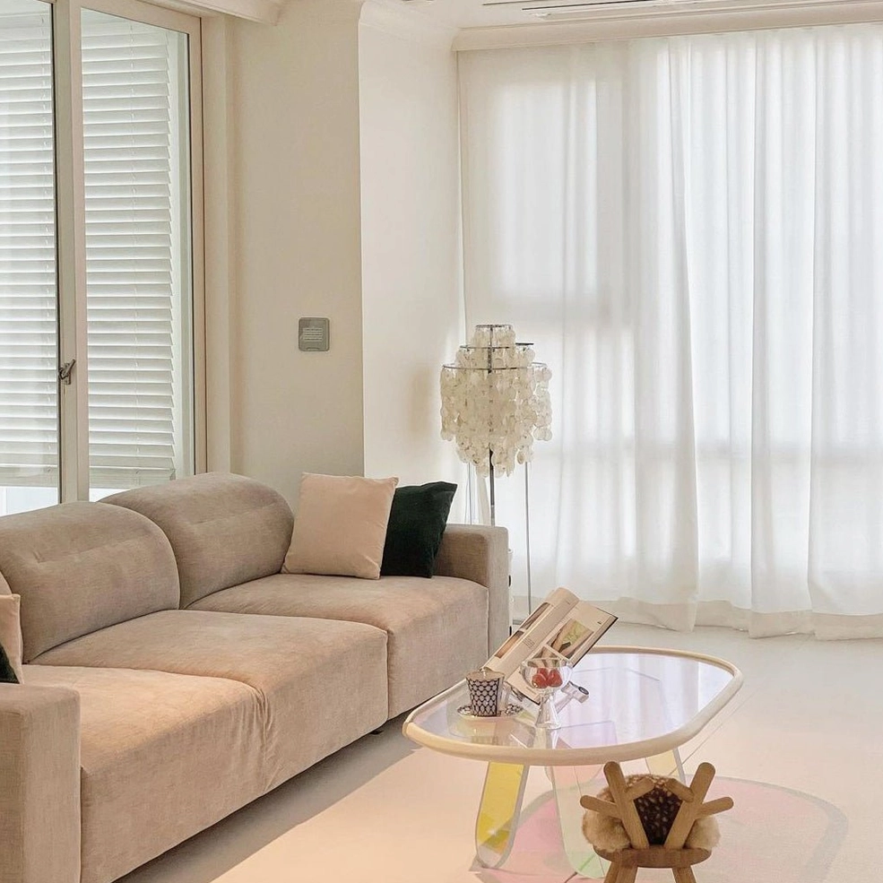 Capiz shell floor lamp tiered design creating visual rhythm and dimensional lighting