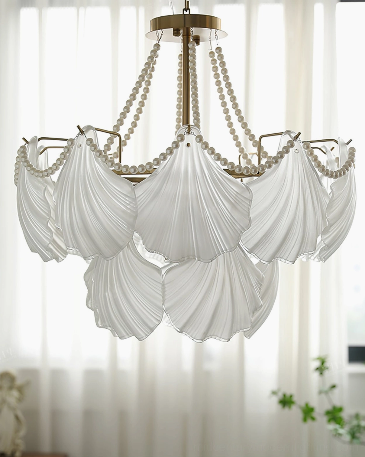 Layered tiered scallop shell glass chandelier with pearl chain trim and frosted milky white shades