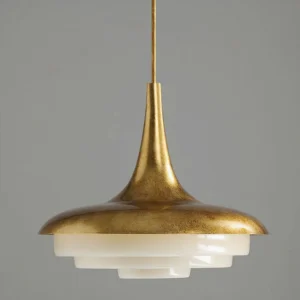 Side profile of layered frosted resin pendant light showing tapered brass top and glass shade detail