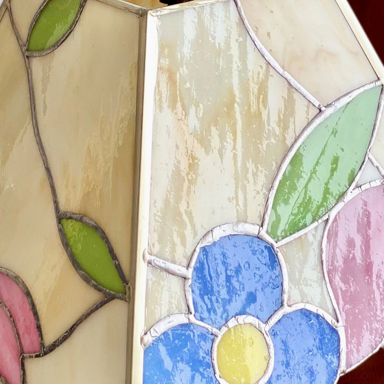 Tiffany stained glass lamp with floral motif on living room side table Art Nouveau style